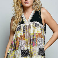 Black sheer floral V-neck tank top with lace-edged neckline and patchwork blocks