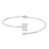Silver bangle bracelet with initial E charm and small round crystal accents