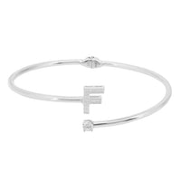 Silver slim bangle with crystal initial F centerpiece, top view