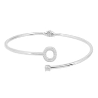 Silver bangle bracelet with round O charm and small stud detail