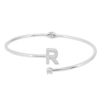 Silver bangle bracelet with clear 'R' initial centerpiece
