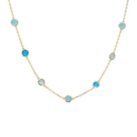 Gold-tone necklace with small round blue stones on a linked chain