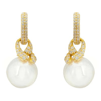 Gold drop pearl earrings with crystal pavé knot links