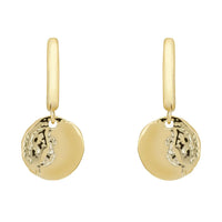 Gold huggie hoop earrings with round coin charm and moon/star engraving