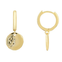 Gold huggie hoop earrings with round pendant charm on small hoop