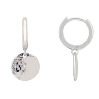 Silver huggie hoop earrings with round moon charm and small dangling drop