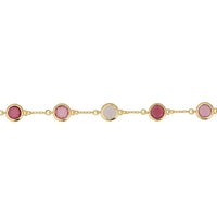 Gold chain bracelet with alternating pink and pale gray oval charms