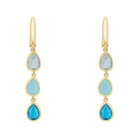 Gold triple teardrop earrings with three blue stones on each drop