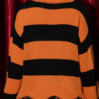 Orange and black striped turtleneck sweater with fringe hem, long sleeves, back