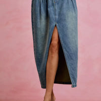 Washed denim pleated midi skirt with front slit and button waistband