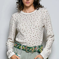Ivory ribbed knit crew neck long sleeve top with tiny floral print
