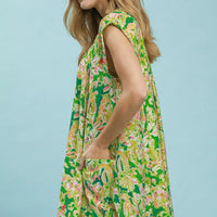 Green floral swing dress with flutter sleeves and round neckline, above-knee length