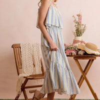 Blue and white striped tiered midi dress with spaghetti tie shoulder straps