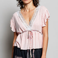 Blush pink striped peplum blouse with V-neck lace trim, ruffled short sleeves, tie waist