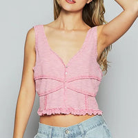 Blush pink V-neck cropped tank with lace-like panel and textured fabric