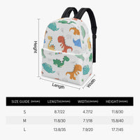 White canvas dinosaur backpack with black shoulder straps, shown with size dimensions