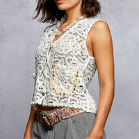 Off-white crocheted cropped sleeveless vest with scalloped neckline and front buttons
