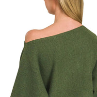 Back view of dark olive boat-neck sweater with wide, draped sleeves