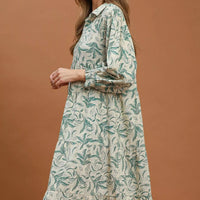 Green linen botanical print tiered midi dress, long sleeves, V-neck front
