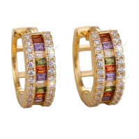 Gold huggie hoop earrings with rainbow baguette stones and clear pavรฉ accents