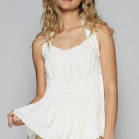 Off-white halter sleeveless top with smocked shirring and scalloped neckline