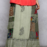 Embroidered sage patchwork ruffled skirt with decorative center motif