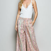 Women's off-white lace-trim V-neck cami with spaghetti straps, standing view