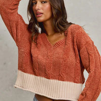 Rust chenille V-neck cropped sweater with cream ribbed cuffs and hem