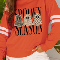 Orange ghost trio pullover sweatshirt with varsity striped sleeve cuffs