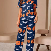 Navy Halloween pajama lounge set with pumpkin and bat print, short-sleeve button top and pants