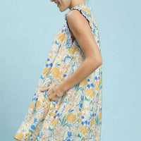 Floral babydoll dress, sleeveless with gathered neckline, side view of blue-yellow print