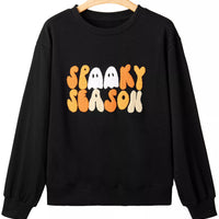 Black long-sleeve crewneck sweatshirt with embroidered orange “Spooky Season” lettering