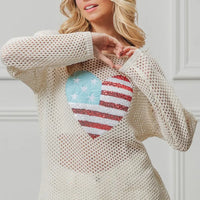 Off-white sequin knit sweater with American flag heart patch, long sleeves.
