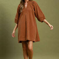 Camel brown corduroy V-neck shift dress with puff sleeves and above-knee hem