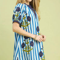 Blue striped short-sleeve dress with navy contrast hem and floral print