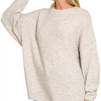 Oversized bone melange sweater with round neck, exposed seams, long sleeves