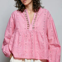 Pink eyelet lace blouse with split V neck placket and puff sleeves; gathered empire waist