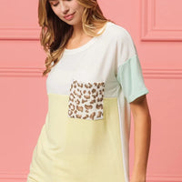 Color block crew neck T-shirt with leopard pocket detail and mint sleeve panels, pale yellow front