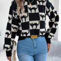 Black checkerboard Halloween graphic sweater, long sleeves, crew neck