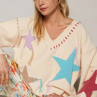 Pale beige V-neck long-sleeve sweater with pastel star prints