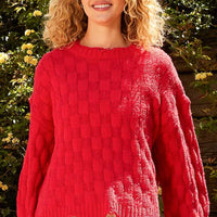 Red checkered distressed edge sweater with scalloped hem and knit texture