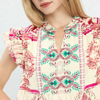 Boho print ruffle sleeve dress close-up, keyhole neckline with teal floral panel