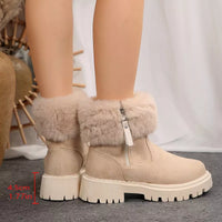 Off-white faux fur ankle boots with side-zip closure and chunky platform lug sole