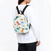 Kids dinosaur canvas backpack with black straps worn on back