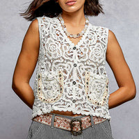 Off-white crocheted cropped button-down vest with scalloped edge and decorative front buttons