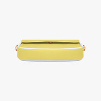 Yellow leather mini shoulder bag with front flap and thin gold chain strap.