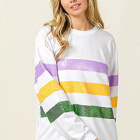 Off-white round-neck sweatshirt with sequined horizontal Mardi Gras stripes, long sleeves