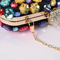 Crystal clutch bag with gold-tone clasp, detachable chain strap