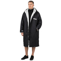 Black long changing robe with gray fleece-lined hood and front pockets, modeled
