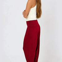 Wine harem trousers with elastic waist and cuffed ankle cuffs